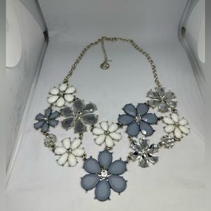 Statement necklace with floral pattern.